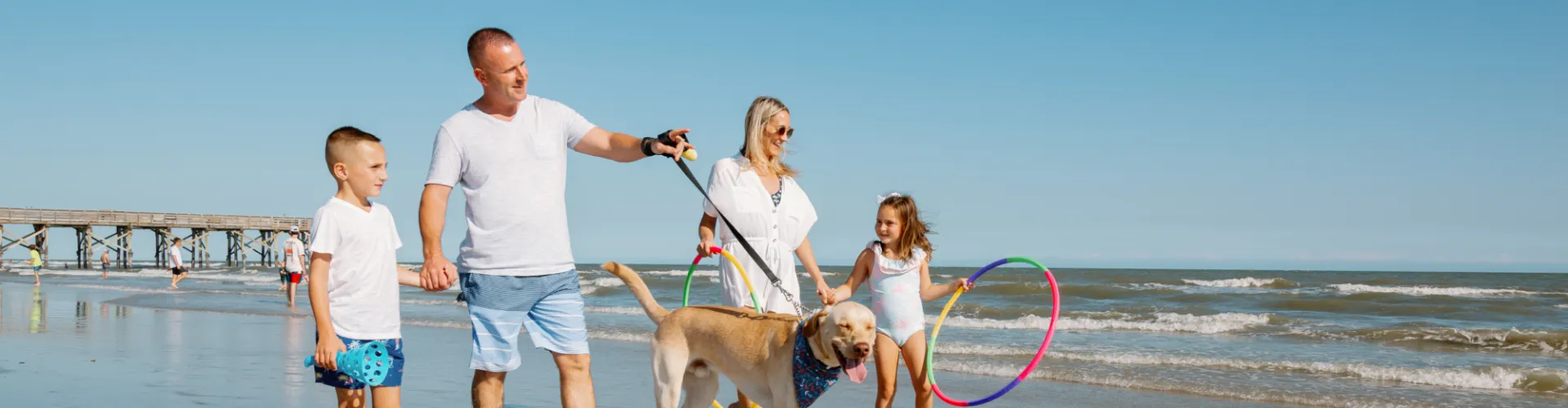 Family and Dog at the beach