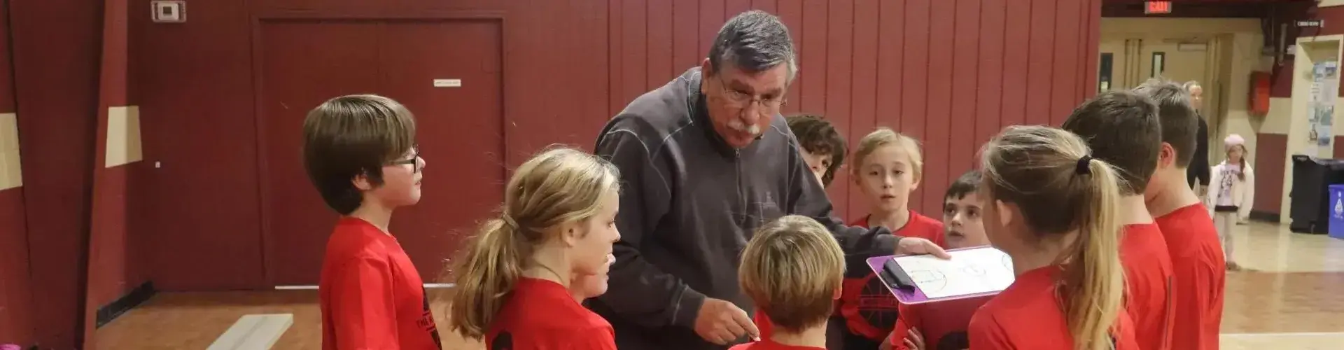Youth athletics coach and team