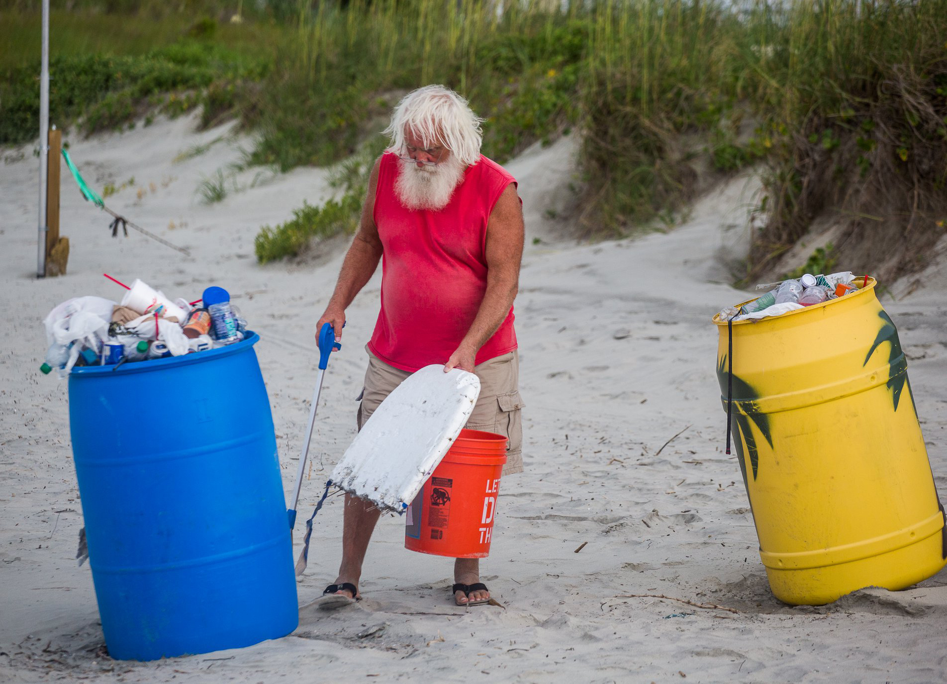 beach santa picking up litter